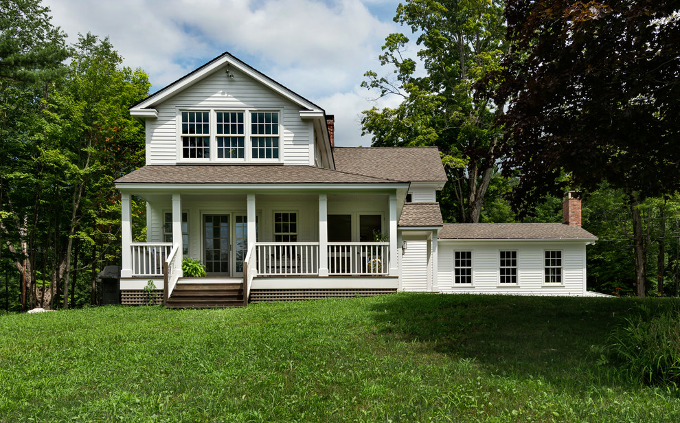 Design ideas for a country split-level white exterior in New York.
