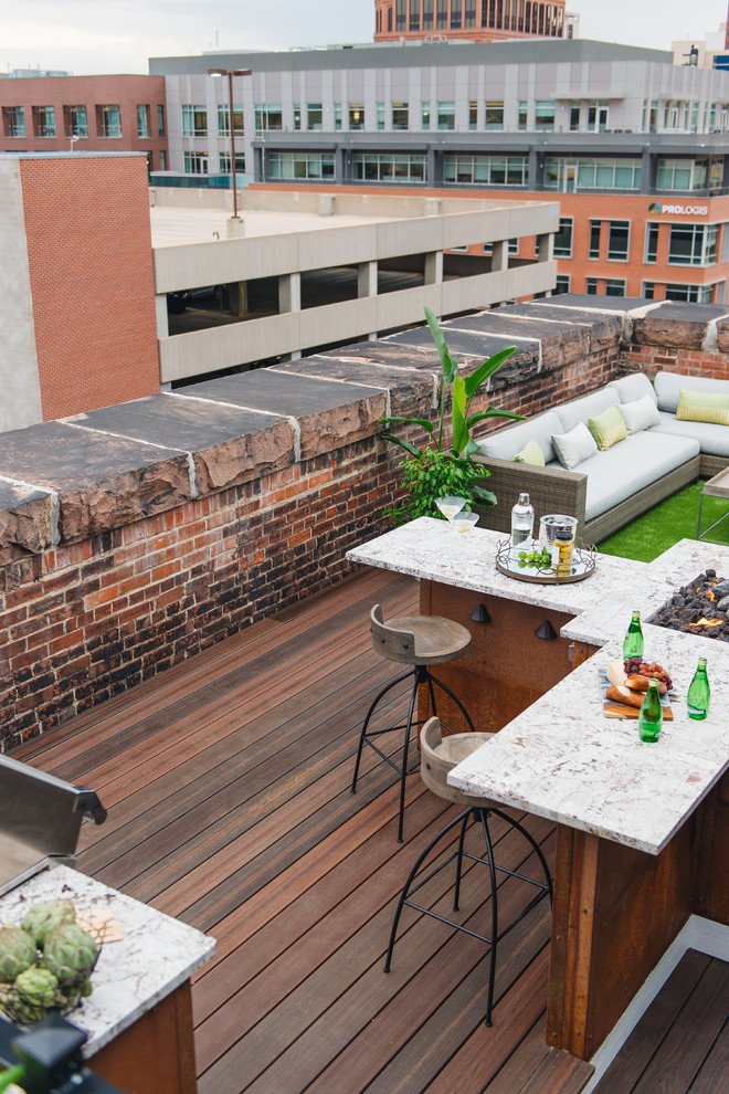 Design ideas for a mid-sized modern rooftop and rooftop deck in Denver with a fire feature.