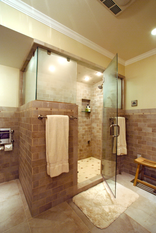 Mid-sized traditional bathroom in Portland with shaker cabinets, medium wood cabinets, a one-piece toilet, gray tile, stone tile, beige walls, porcelain floors, an undermount sink, granite benchtops and with a sauna.