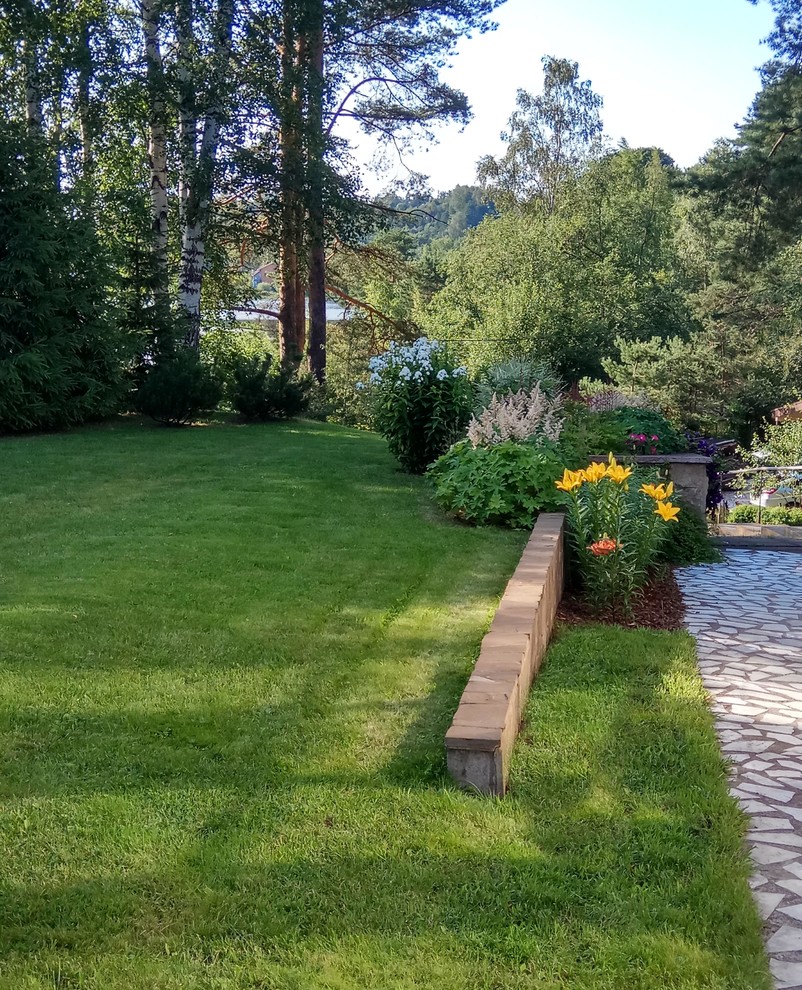 Озеленение рельефного участка в Токсово