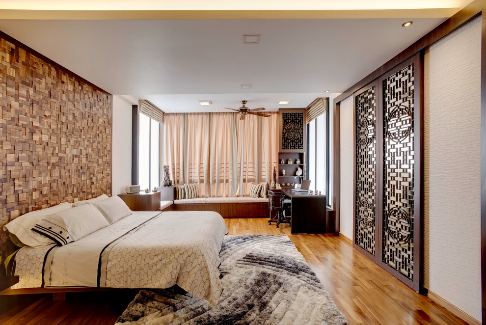 Photo of an Asian Master bedroom in Singapore.