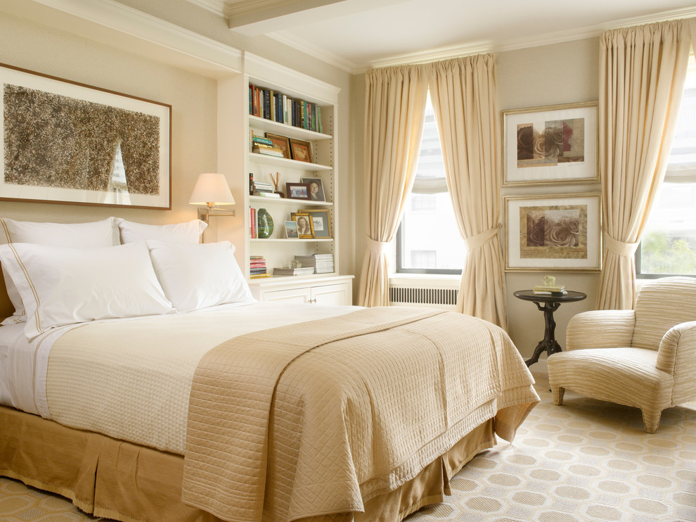 Inspiration for a traditional master bedroom in New York with beige walls.
