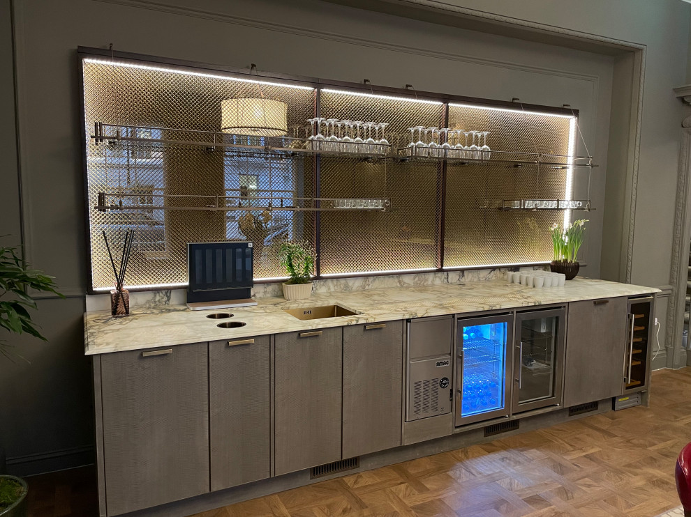 Inspiration for a contemporary home bar in Essex with an undermount sink, flat-panel cabinets, marble benchtops, multi-coloured splashback, marble splashback and multi-coloured benchtop.