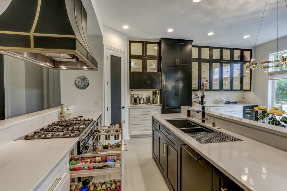 This is an example of a mid-sized transitional eat-in kitchen in Minneapolis with a double-bowl sink, glass-front cabinets, black cabinets, quartz benchtops, white splashback, engineered quartz splashback, panelled appliances, ceramic floors, with island, white floor and white benchtop.