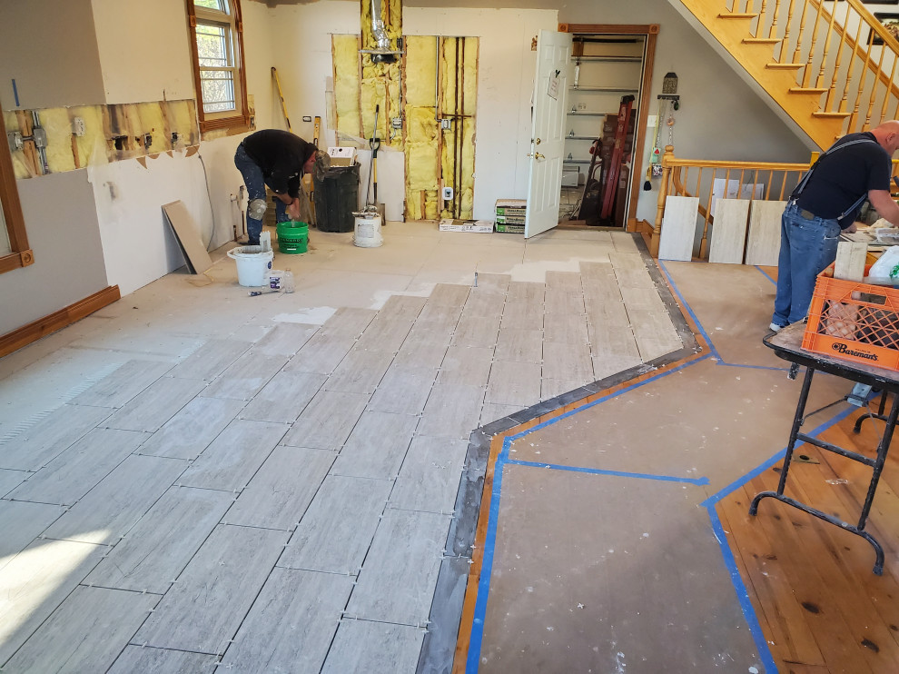Kitchen tile floor with border in progress
