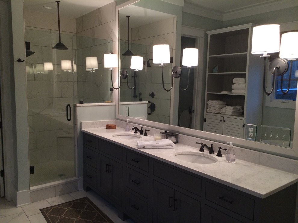 This is an example of a mid-sized traditional master bathroom in Atlanta with open cabinets, white cabinets, a claw-foot tub, an alcove shower, a one-piece toilet, white tile, gray tile, green walls, an undermount sink, marble, ceramic floors and soapstone benchtops.