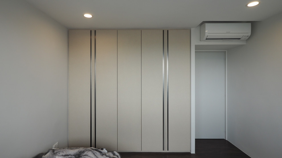 Photo of a contemporary storage and wardrobe in Singapore.