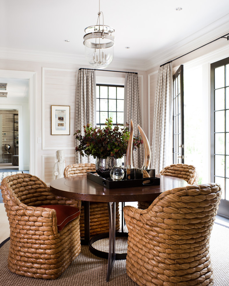 Photo of a transitional dining room in New York with beige walls.