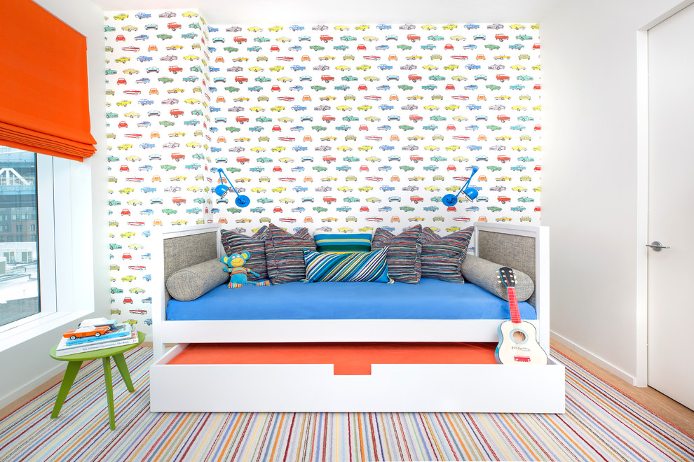 Contemporary toddler room in New York with multi-coloured walls, carpet and multi-coloured floor for boys.