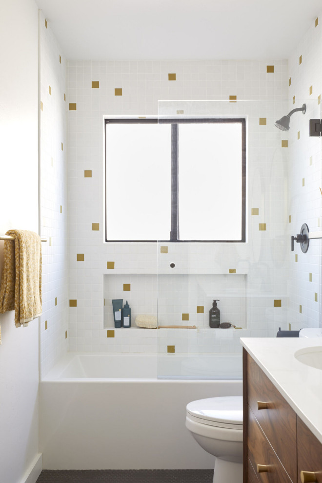 This is an example of a mid-sized modern 3/4 bathroom in San Francisco with a drop-in tub, yellow tile and ceramic tile.