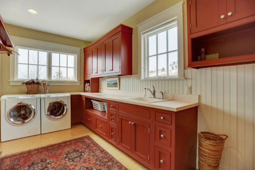 This is an example of an arts and crafts laundry room in Other.