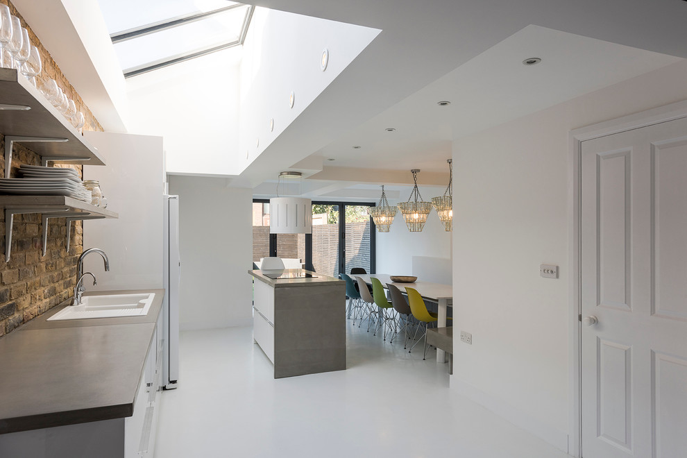 This is an example of a large transitional home design in London.