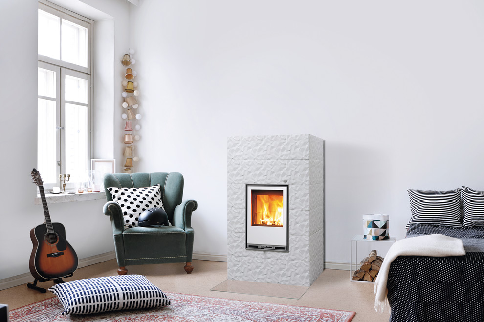 Inspiration for an expansive scandinavian living room in Gloucestershire with a wood stove.