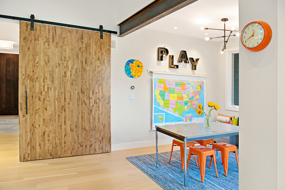 Design ideas for a contemporary kids' playroom in Denver with grey walls, light hardwood floors and beige floor.
