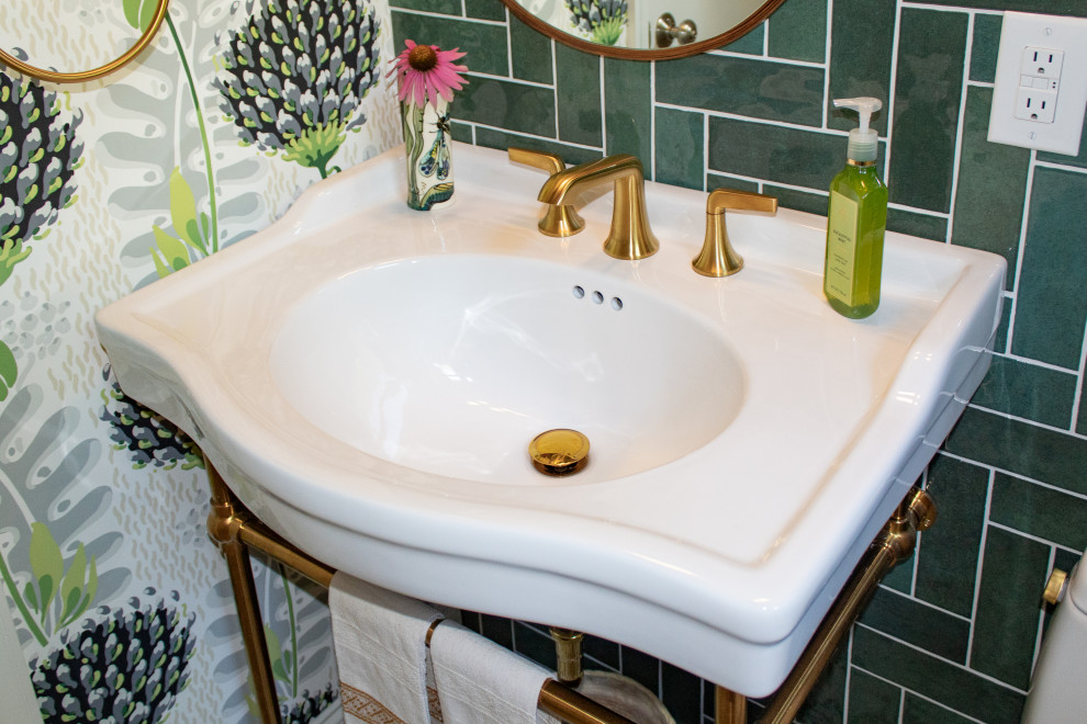 This is an example of a mid-sized contemporary powder room in Bridgeport with white cabinets, a one-piece toilet, green tile, porcelain tile, green walls, mosaic tile floors, a console sink, white floor, a freestanding vanity and wallpaper.