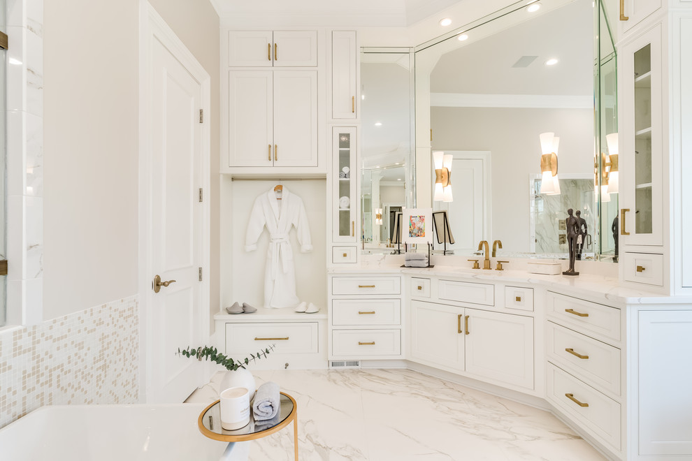 Inspiration for a transitional master bathroom in Atlanta with beaded inset cabinets, white cabinets, a freestanding tub, engineered quartz benchtops and white benchtops.