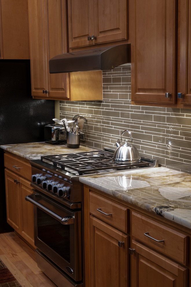 Example of a transitional kitchen design in Seattle