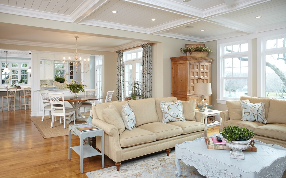 Design ideas for a traditional open concept living room in Grand Rapids with beige walls.