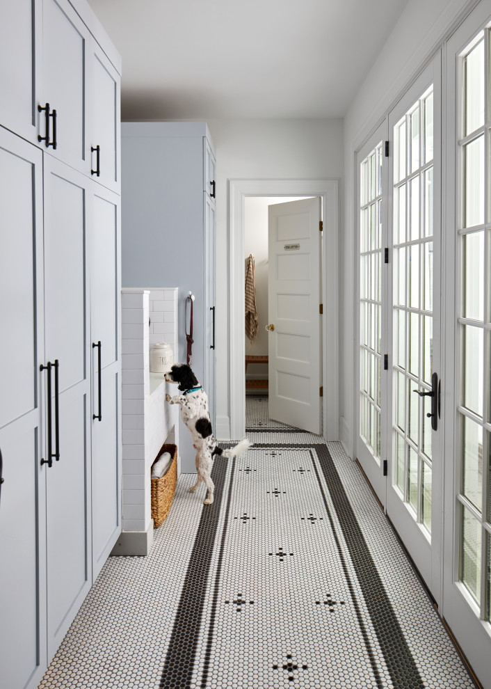 Inspiration for a transitional laundry room remodel in New York