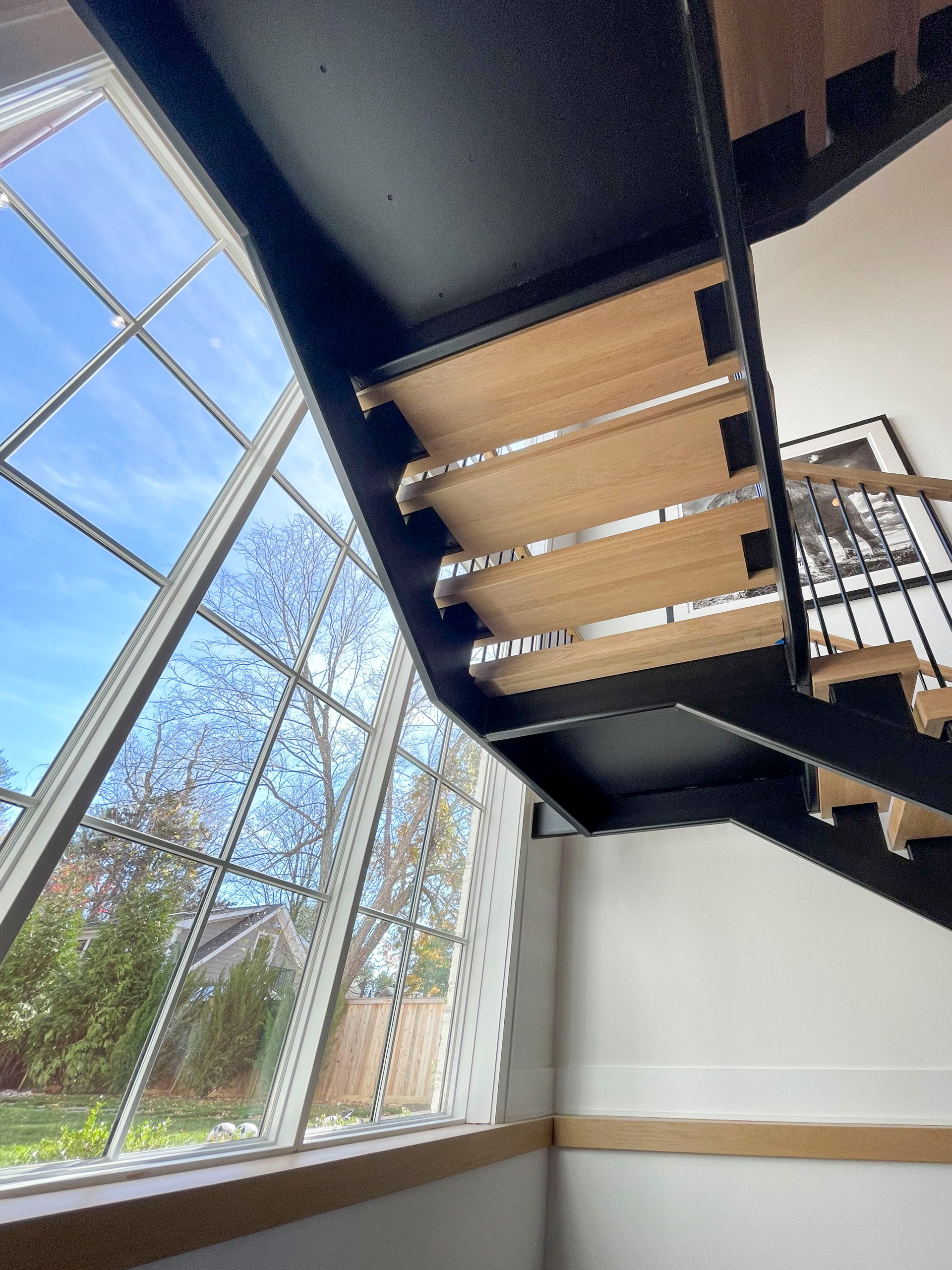 96_Dramatic cantilevered no-riser staircase, Bethesda, MD 20814