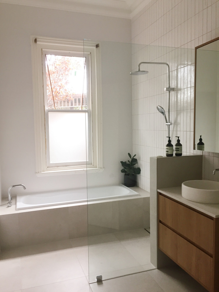 Example of a small eclectic white tile porcelain tile, gray floor and single-sink bathroom design with a vessel sink, quartz countertops and a floating vanity
