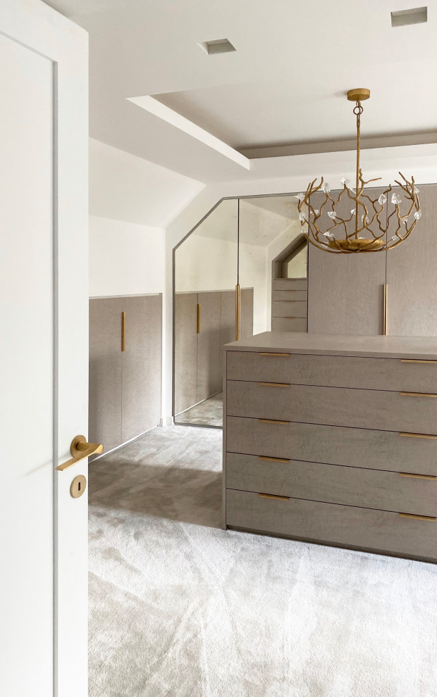 Large contemporary women's dressing room in Manchester with flat-panel cabinets, grey cabinets, carpet, grey floor and coffered.