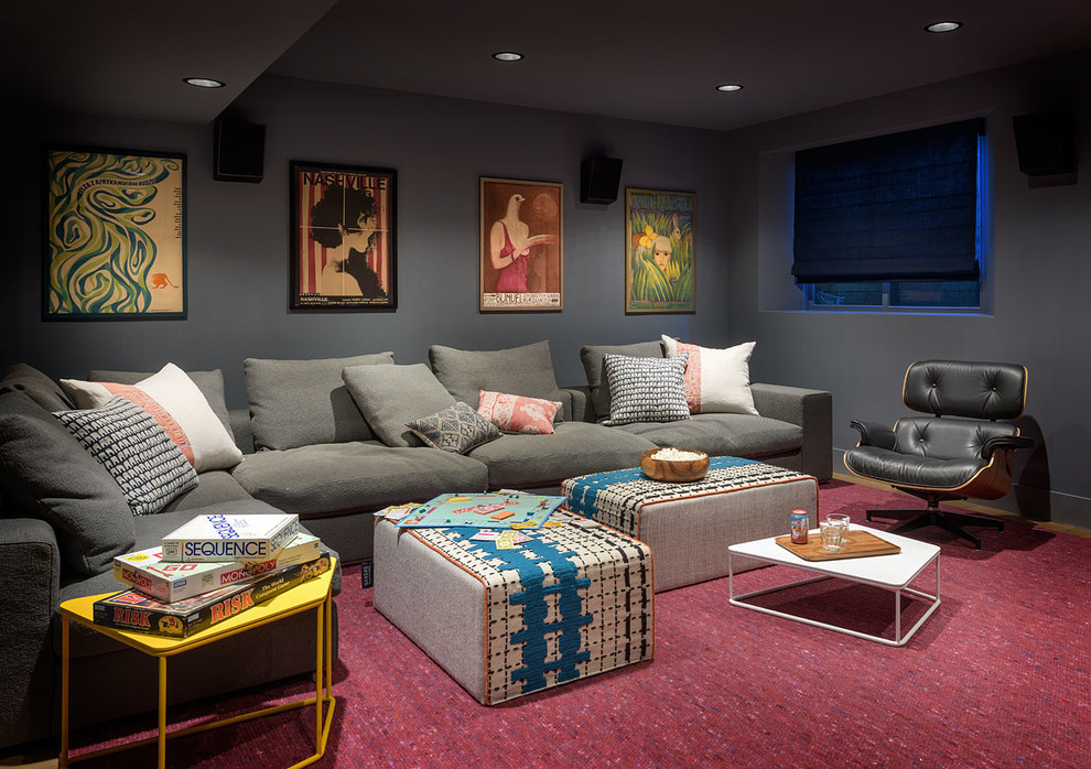 This is an example of a mid-sized transitional enclosed home theatre in San Francisco with blue walls, carpet and red floor.