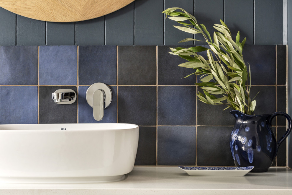Photo of a mid-sized contemporary bathroom in Melbourne with a freestanding tub, an open shower, blue tile, blue walls, ceramic floors, a pedestal sink, engineered quartz benchtops and white benchtops.