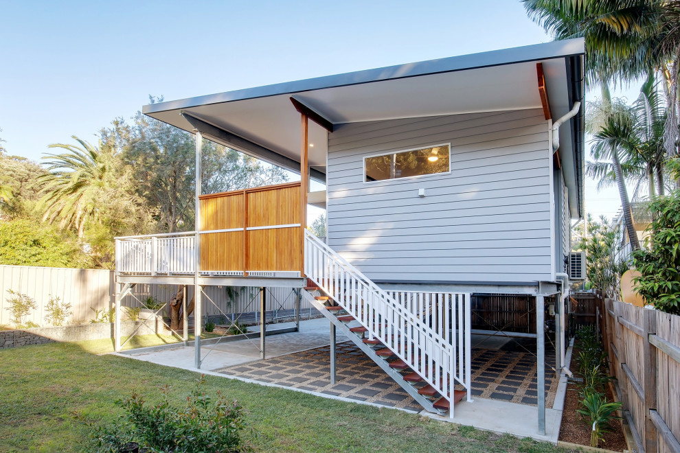 Design ideas for a mid-sized beach style detached granny flat in Sydney.