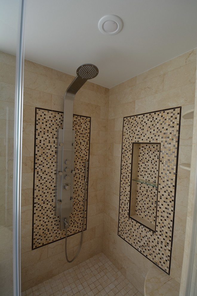 Example of a large transitional master beige tile and stone tile marble floor and beige floor drop-in bathtub design in Baltimore with dark wood cabinets, a two-piece toilet, beige walls, an undermount sink, beaded inset cabinets, solid surface countertops, a hinged shower door and beige countertops
