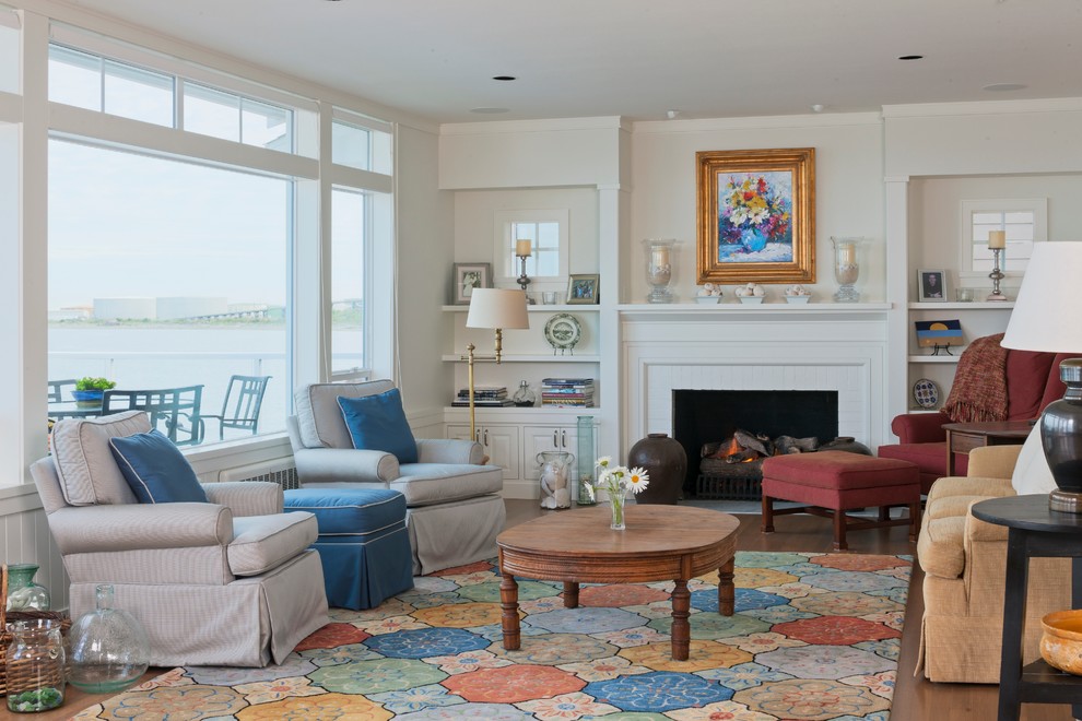 Photo of a beach style formal living room in Seattle with a standard fireplace.