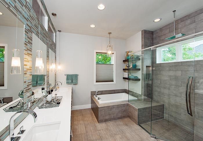 Inspiration for a large transitional master bathroom in Salt Lake City with flat-panel cabinets, grey cabinets, a drop-in tub, a curbless shower, multi-coloured tile, matchstick tile, grey walls, vinyl floors, an undermount sink, solid surface benchtops, grey floor and a hinged shower door.