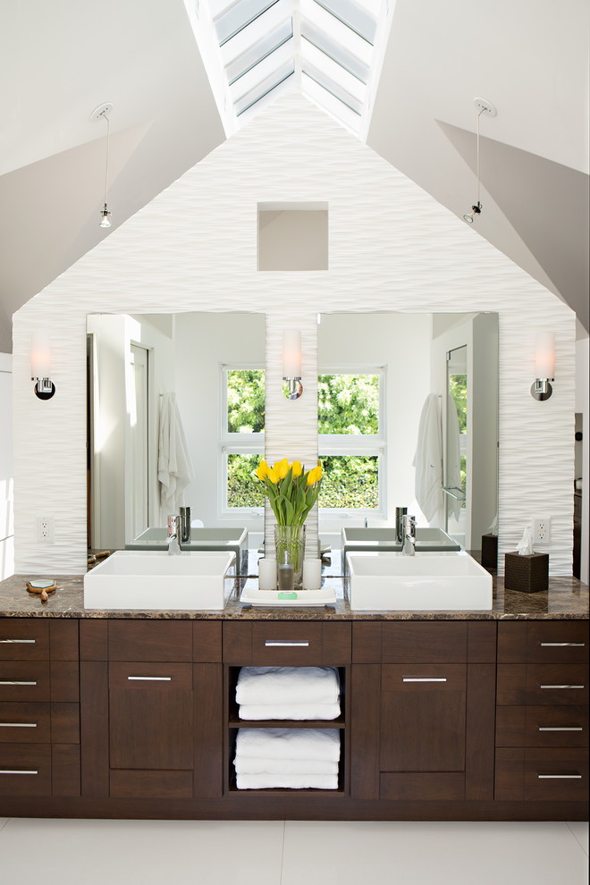 This is an example of a large transitional bathroom in Los Angeles with dark wood cabinets.