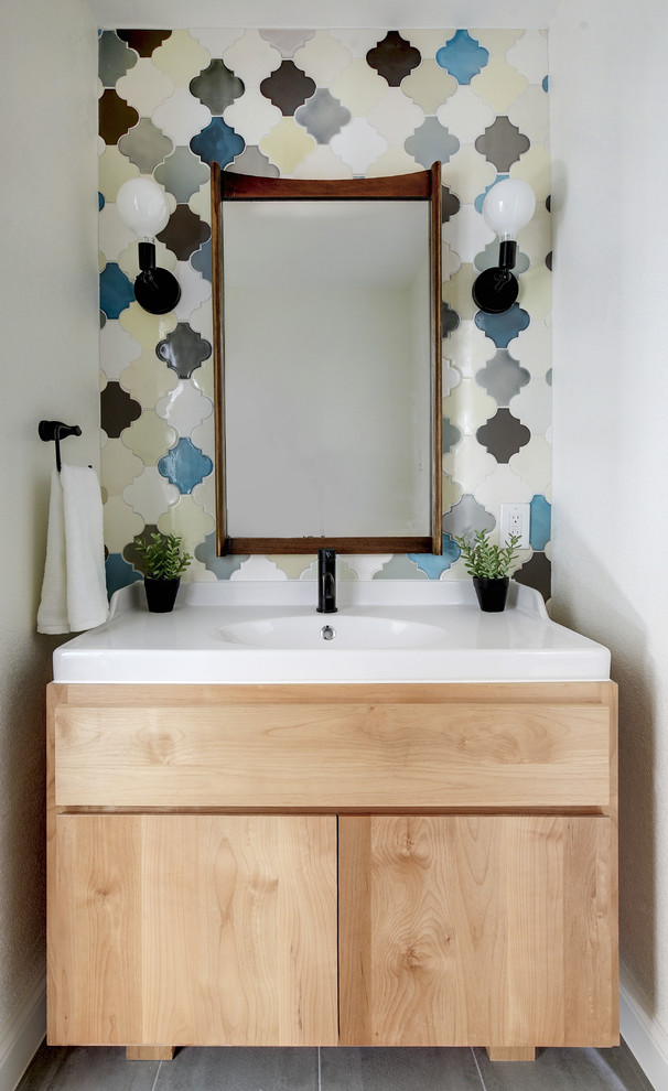 This is an example of a contemporary powder room in Austin.