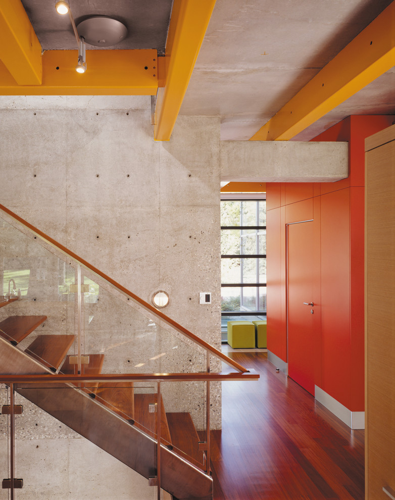 This is an example of an industrial wood floating staircase in Chicago with open risers.