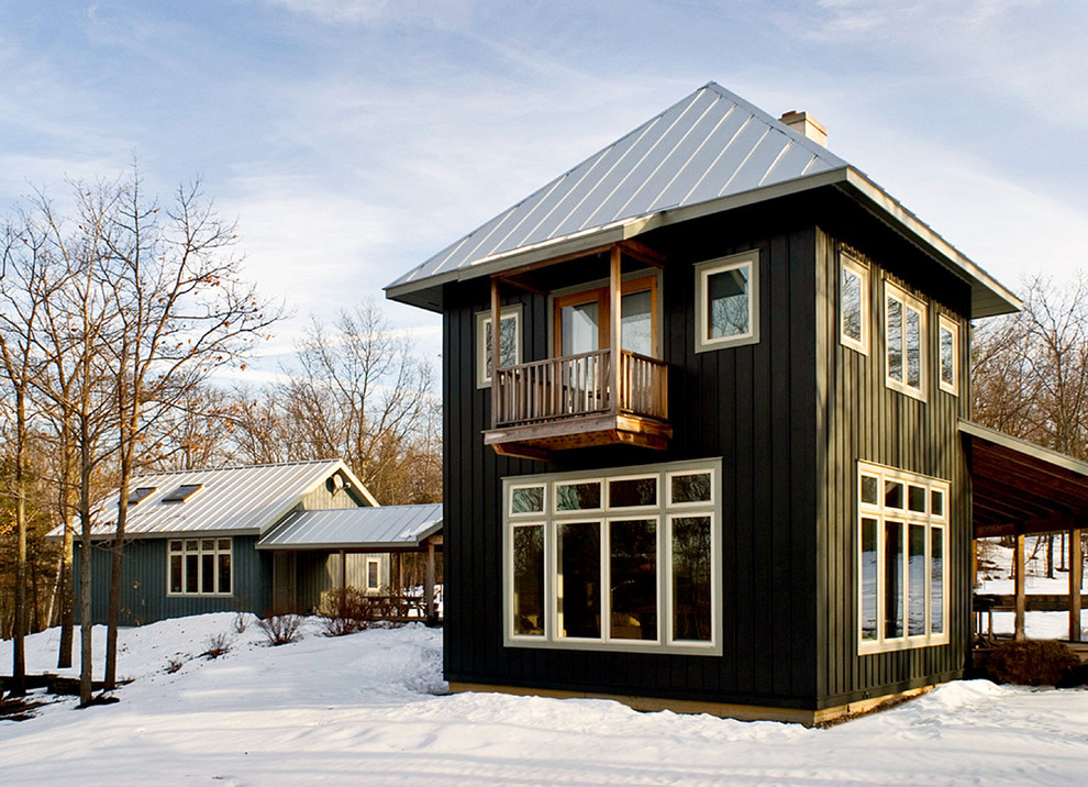 This is an example of a country exterior in Boston with wood siding.