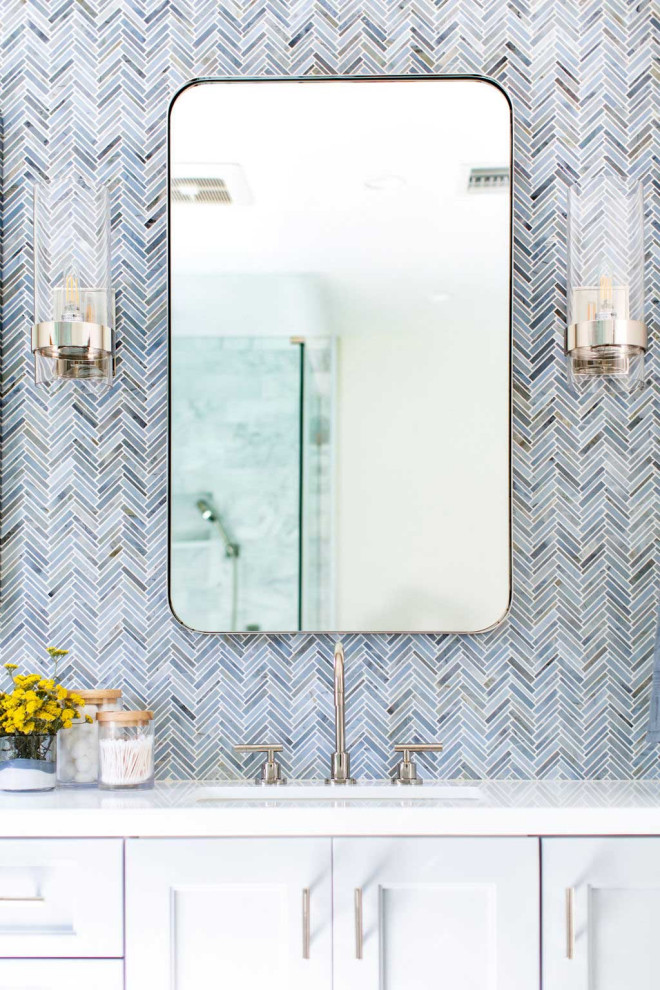 Inspiration for a modern bathroom in Other with recessed-panel cabinets, grey cabinets, gray tile, mosaic tile, an undermount sink, white floor, white benchtops, a double vanity and a built-in vanity.