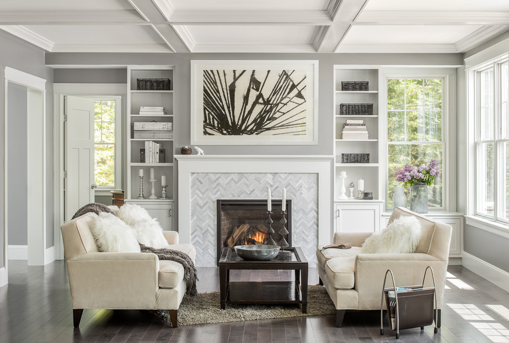 Transitional formal living room in Portland Maine with grey walls, dark hardwood floors, a standard fireplace and no tv.