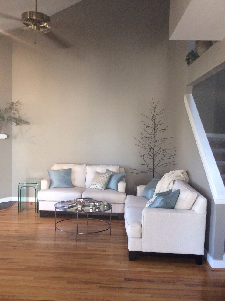 Size of art for very tall wall in living room