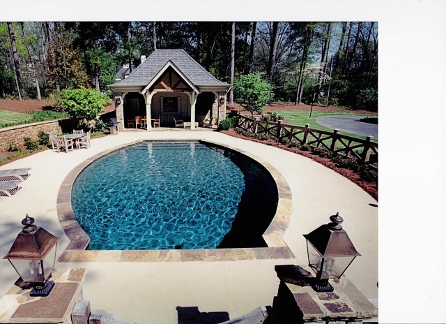 Pool fountain - mid-sized rustic backyard concrete and custom-shaped pool fountain idea in Atlanta