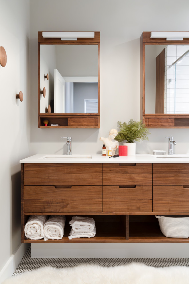 Contemporary master bathroom in Boston with flat-panel cabinets, dark wood cabinets, grey walls, mosaic tile floors, an undermount sink, white floor, white benchtops, a double vanity and a floating vanity.
