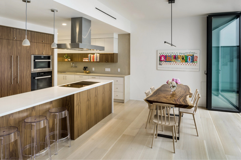 Inspiration for a contemporary kitchen in Boston with light hardwood floors.