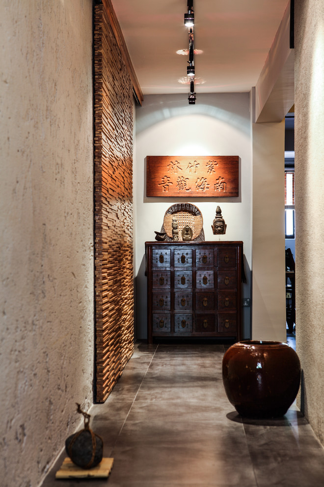 Inspiration for an asian hallway in Singapore with white walls.