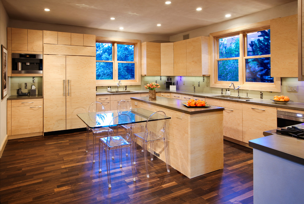 Transitional u-shaped dark wood floor eat-in kitchen photo in Denver with an undermount sink, flat-panel cabinets, light wood cabinets, beige backsplash, stainless steel appliances and an island