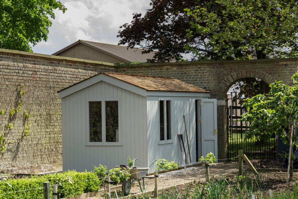 Photo of an expansive traditional detached garden shed in Other.