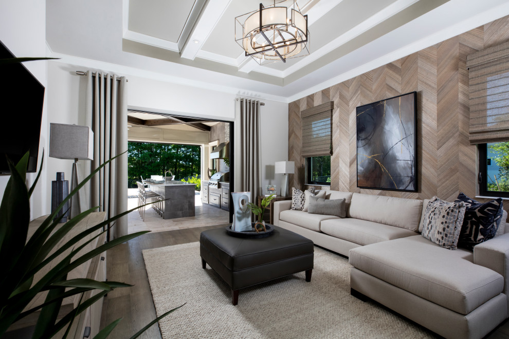 This is an example of a mediterranean family room in Miami.