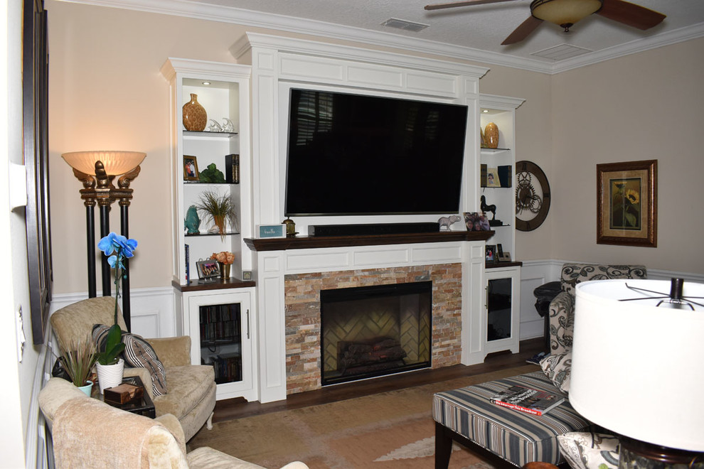 Design ideas for a traditional living room in Jacksonville with a stone fireplace surround.