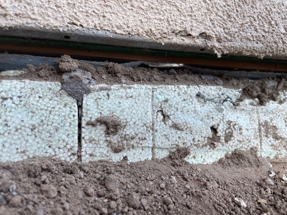 exterior wall gap between foundation and bottom of stucco.