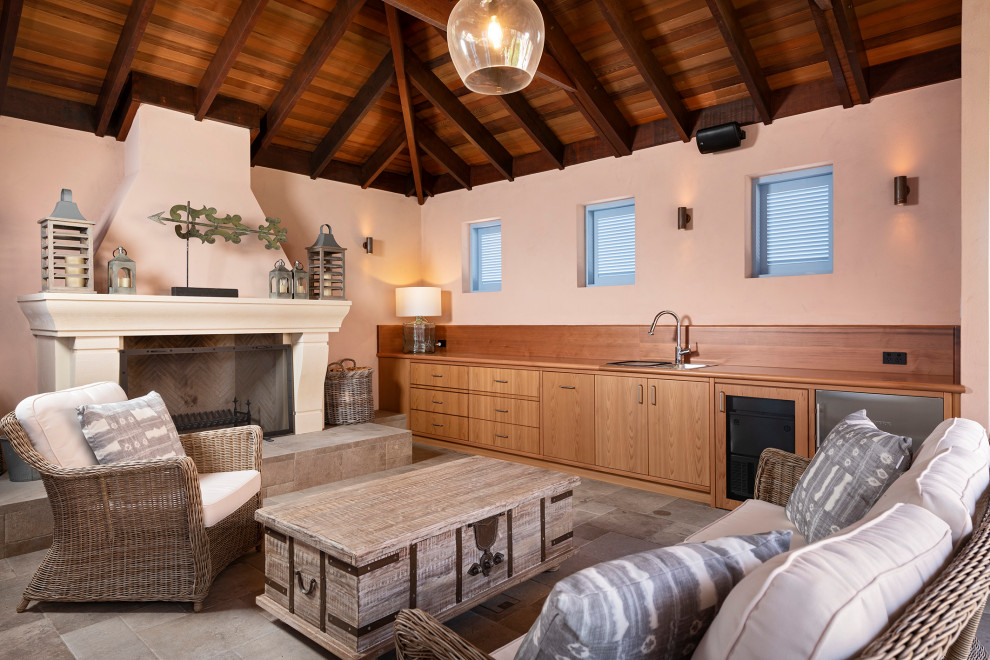 Design ideas for a transitional patio in Perth with with fireplace, tile and a roof extension.