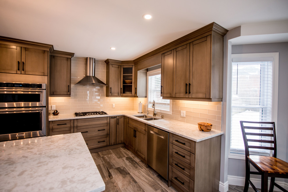 Kitchen - transitional kitchen idea in Toronto